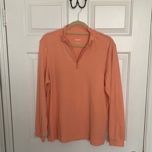 Blair Peach Long Sleeve Ribbed Mock neck Top with Front Zip closure.